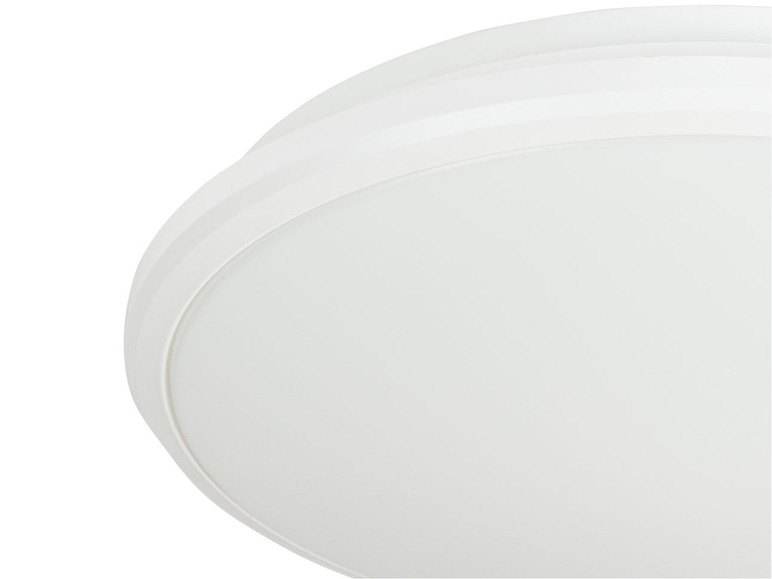 Eine weiße Deckenleuchte mit runder Form.