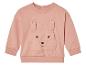 Ein rosa Baby-Sweatshirt mit langen Ärmeln mit einem Kaninchen darauf