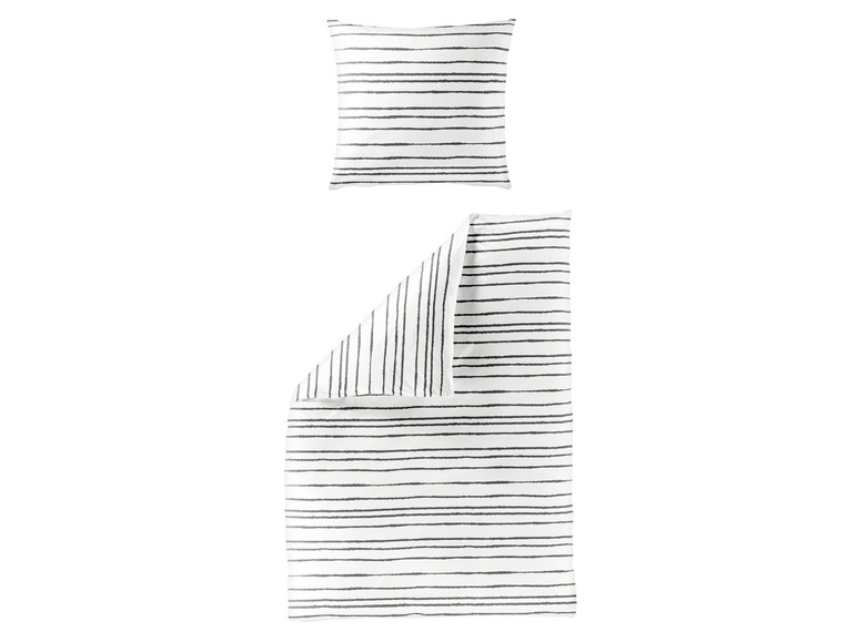 Ein weißer Bettbezug mit schwarzen Streifen, einschließlich eines Kissenbezugs