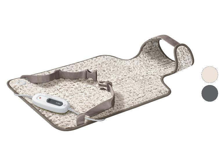 Sanitas Heizdecke mit Befestigungsgurten und Fernbedienung, in hellen und dunklen Farben.