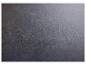 Textur eines dunkelgrauen, körnigen Materials.