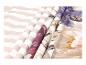 Stoffe: gestreift, lila und mit Blumenmuster
