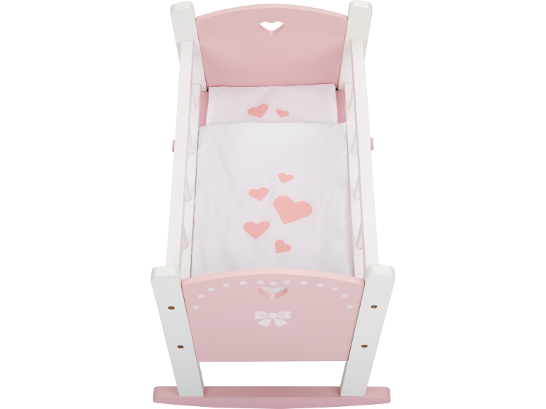 Rosa-weiße Puppenwiege mit Herzen und Schleifenmotiv.