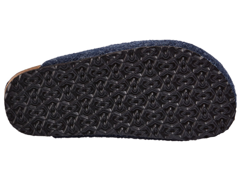 Die Sohle eines dunkelblauen Hausschuhs.
