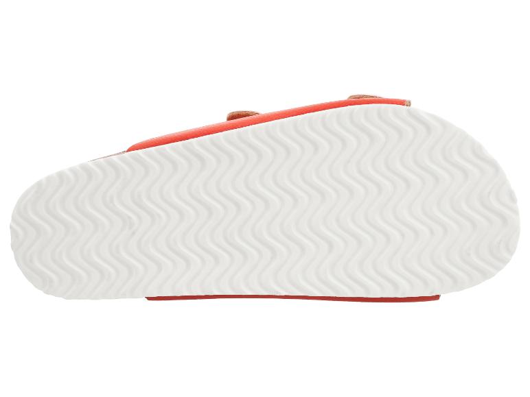 Sandalensohle mit Wellenmuster in Weiß und orangefarbenem Rand.