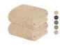 Zwei weiche, gerippte Handtücher in Beige.
