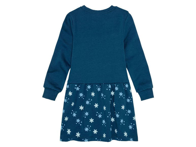 Ein dunkelblaues Mädchenkleid mit langen Ärmeln und einem Schneeflockenmuster.