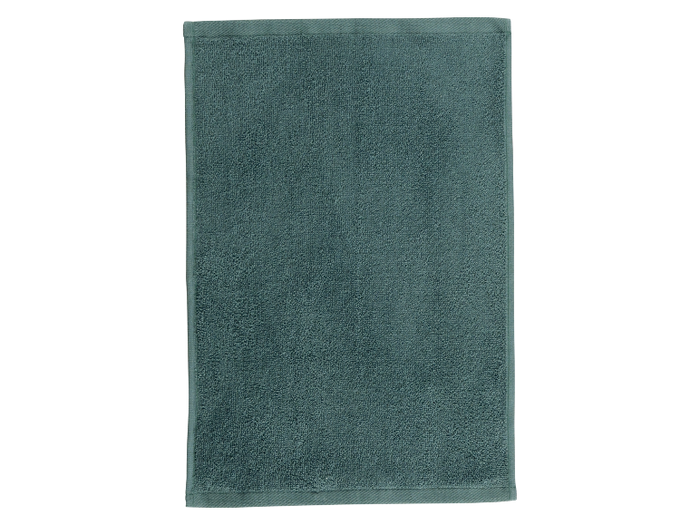 Ein dunkelgrünes Badehandtuch.