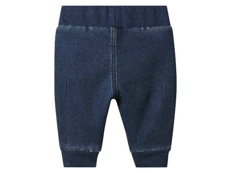 Dunkelblaue Jeans-Babyhose mit elastischem Bund und Bündchen.