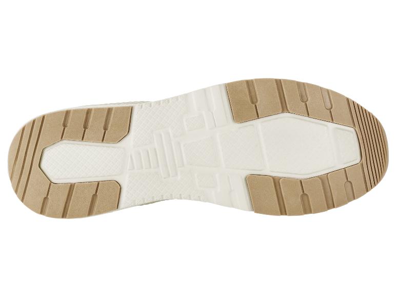 Schuhsohle mit beigem und weißem Texturmuster.