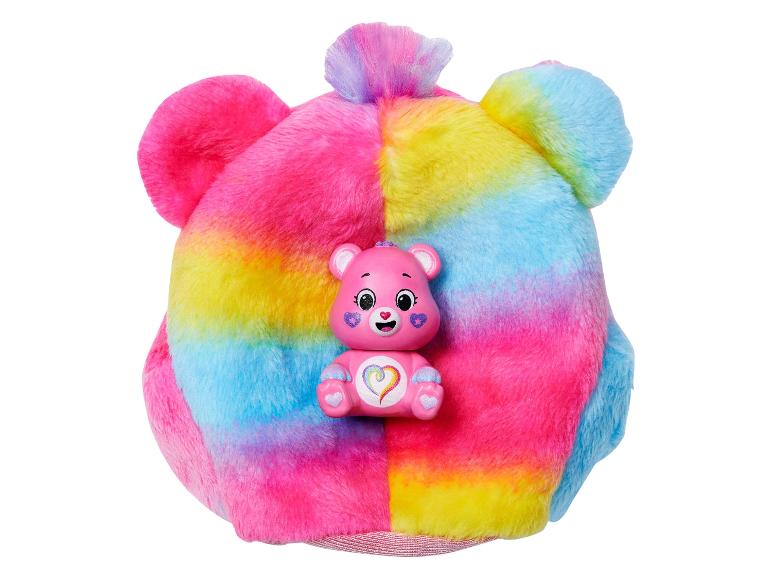 Regenbogen-Plüschkissen mit einer pinken Care Bear Figur