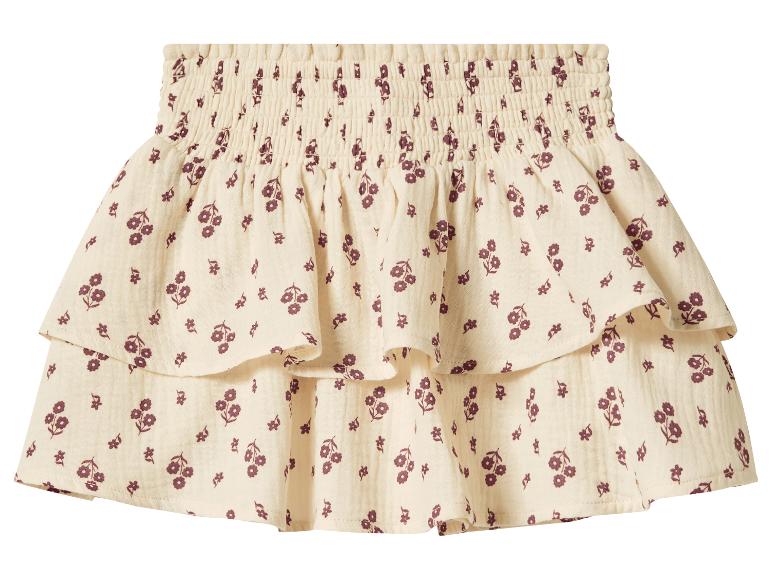 Cremefarbener Rüschen-Minirock mit lila Blumenmuster und gesmokter Taille.