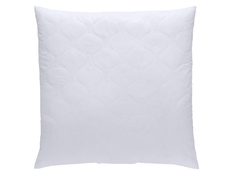 Weißes gestepptes Kissen mit Wellenmuster