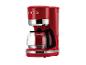 Rote Kaffeemaschine mit Glaskanne und silbernen Details, mit der Aufschrift „1973“.