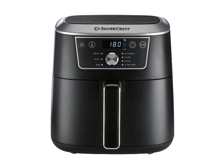 Schwarze Heißluftfritteuse mit Digitalanzeige, die 180°C anzeigt.