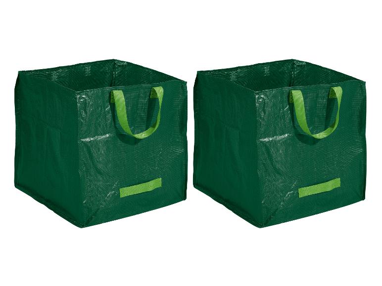 Zwei grüne Müllsäcke mit Griffen.