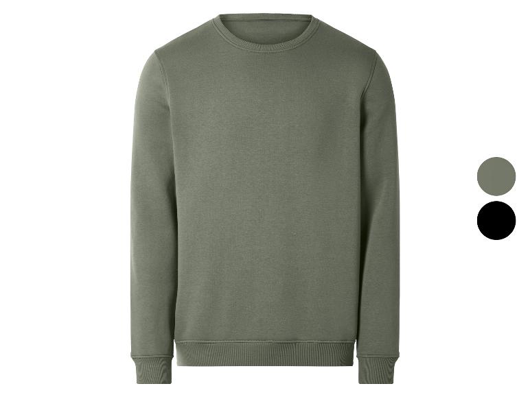 Grünes Rundhals-Sweatshirt mit zwei Farbmustern: grün und schwarz.