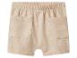 Beige Sweatshorts mit elastischem Bund und zwei Taschen.