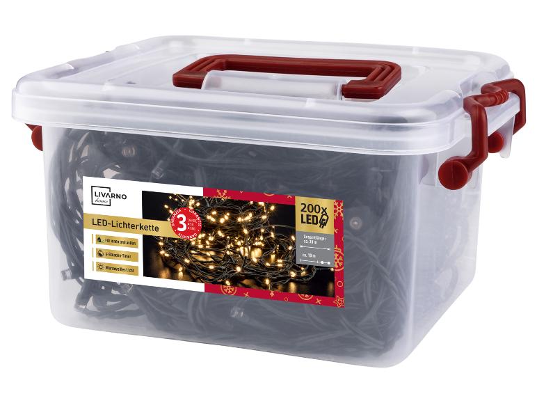 Transparente Box mit Livarno Home LED-Lichterkette, mit 200 LEDs und einer Gesamtlänge von 30 m.