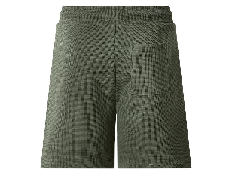 Dunkelgrüne Waffelstrick-Shorts mit Gesäßtasche.