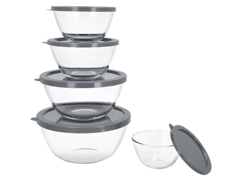Set aus Glasschüsseln mit grauen Deckeln, gestapelt und eine daneben.
