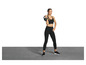 Eine Frau in Sportkleidung trainiert mit einer Kettlebell.