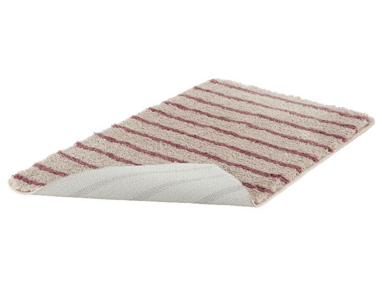 Beige-lila gestreifte Badematte, mit sichtbarer rutschfester Unterseite.