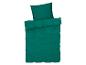 Ein dunkelgrüner Bettbezug mit passendem Kissenbezug.