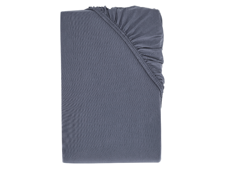 Grauer Baumwoll-Matratzenschoner.