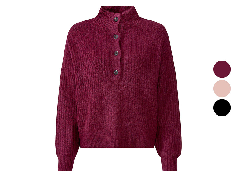 Ein rosa, bordeauxroter und schwarzer Pullover mit Knöpfen.