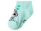 Mintgrüne Kindersocke mit Cartoon-Einhorn und Sternen.