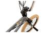 Graues BMX-Fahrrad mit beigen Reifen und silbernem Lenker.