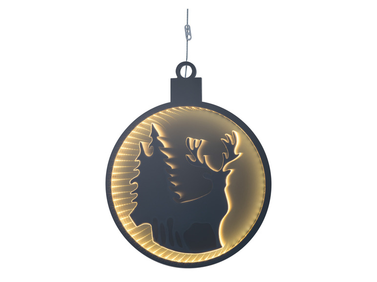 Weihnachtskugel mit einem Rentier und einem Weihnachtsbaum