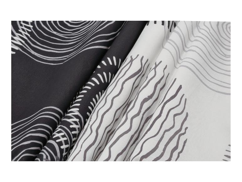 Stoff mit welligem Streifenmuster in Schwarz und Weiß