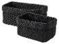 Zwei schwarze, gehäkelte Körbe, einer größer als der andere.