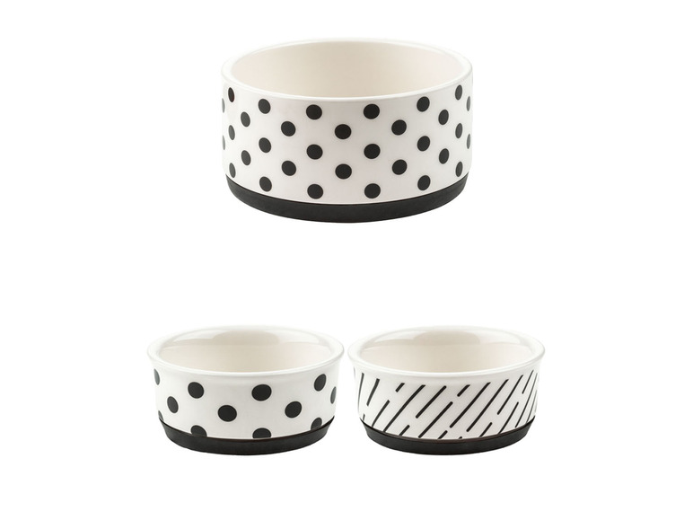 Drei weiße Schalen mit schwarz-weißen Punkten und Streifen.