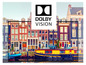Ein Fernseher mit Dolby Vision zeigt eine Szene mit farbenfrohen Häusern an einem Kanal in Amsterdam.