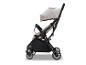 Leichter beiger und schwarzer Kinderwagen mit Verdeck und Einkaufskorb