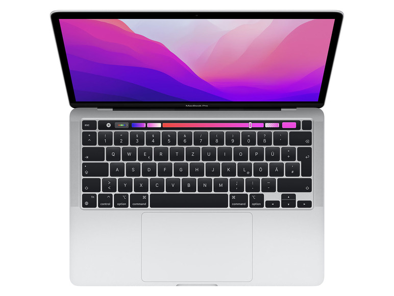 Ein silbernes MacBook Pro mit offenem Bildschirm und einer Tastatur