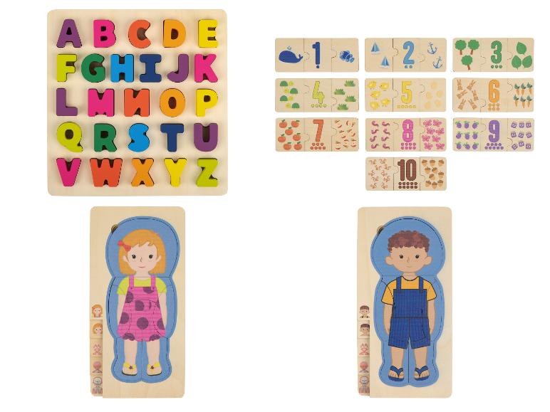 Holzpuzzles mit Alphabetbuchstaben, Zahlen und Kinderfiguren.