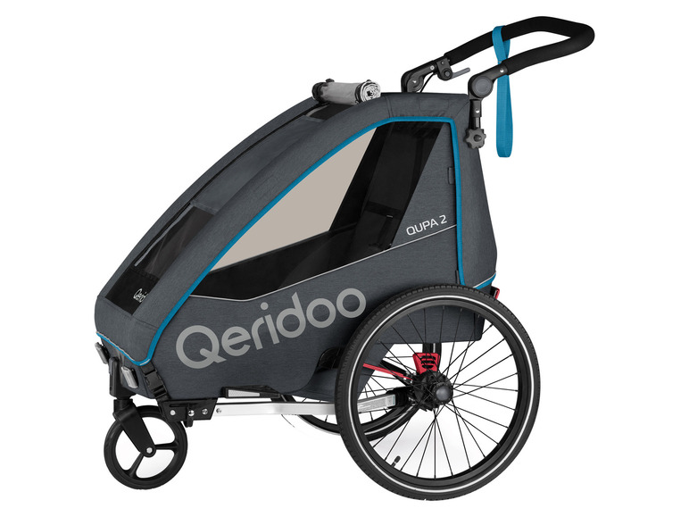 Ein grauer Qeridoo QUPA 2 Fahrradanhänger mit einem großen Rad.