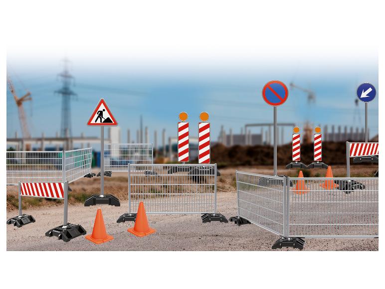 Bauset mit Zäunen, Schildern und Kegeln.