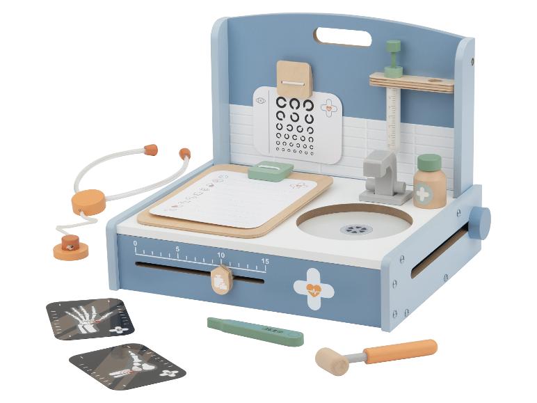 Holz-Doktorspielset mit Stethoskop, Sehtafel und Zubehör.