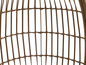 Die Rückenlehne eines Rattan-Hängesessels.