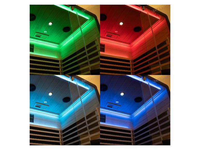 Sauna-Innenraum mit farbiger LED-Beleuchtung in Grün, Rot, Hellblau und Dunkelblau.