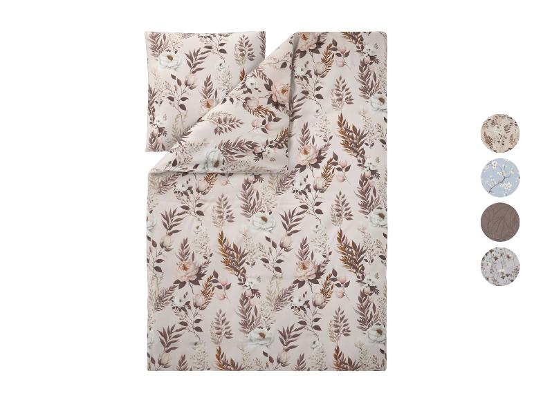 Bettwäsche mit Blumenmuster in Beige- und Brauntönen, mit runden Mustern.