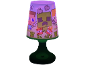 Tischlampe mit Pixel-Charakteren und TNT-Motiv, lila und grün leuchtend.