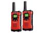 Zwei rote und schwarze Walkie-Talkies mit Bildschirmen und Tasten, inklusive 'TALK' und 'MON'.