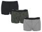 Dreierpack Baumwoll-Boxershorts für Herren: eine schwarze, eine mit Palmenmuster und eine graue.