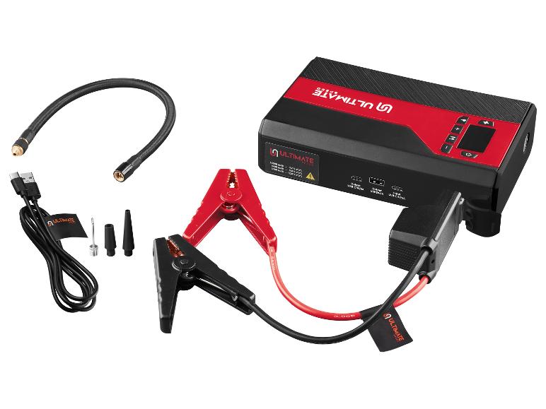 Tragbarer Auto-Starthilfe mit Kompressor, USB-Kabel und Zubehör.